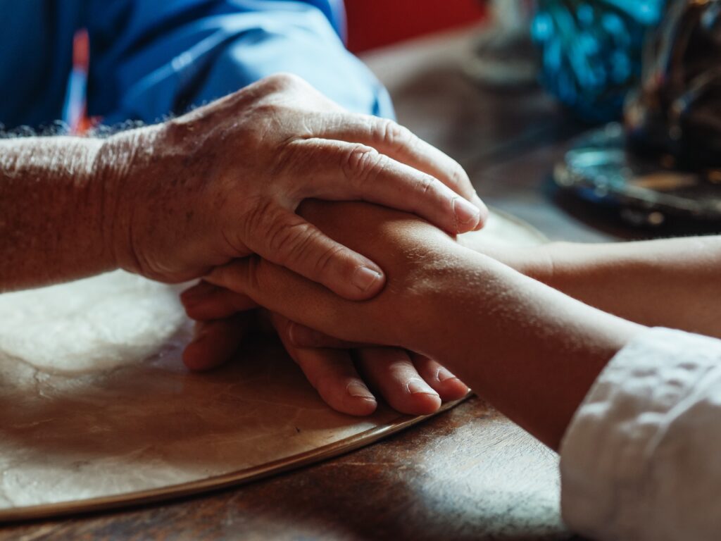 Concerned-hand-holding