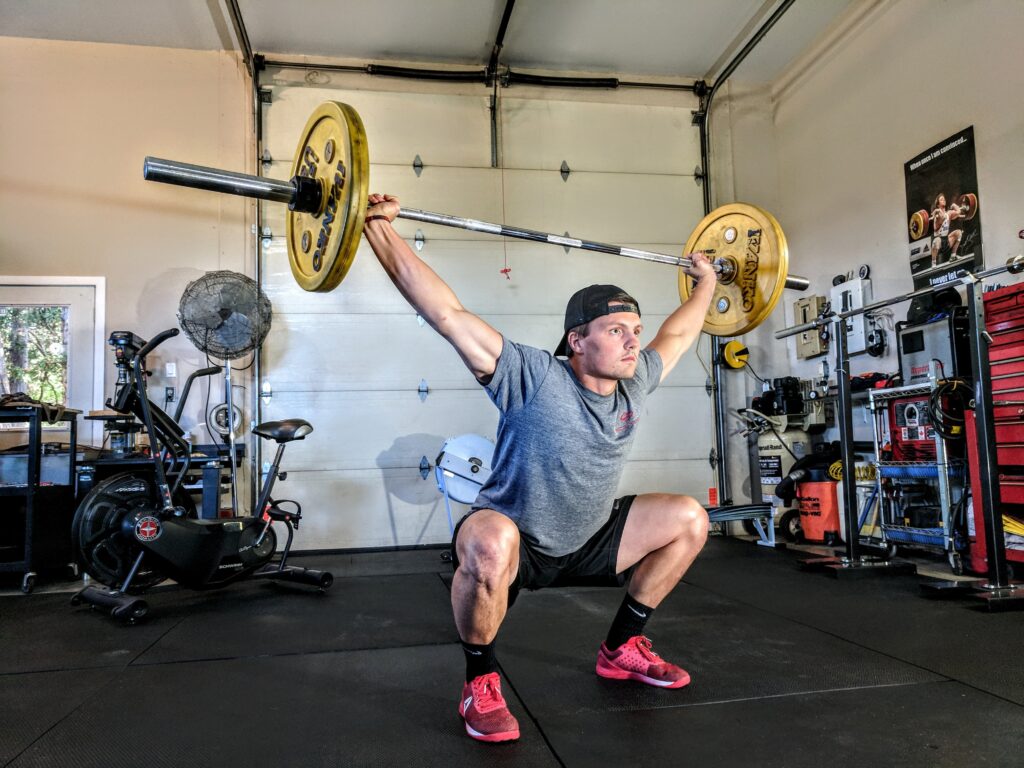 Man performing the barbell snatch